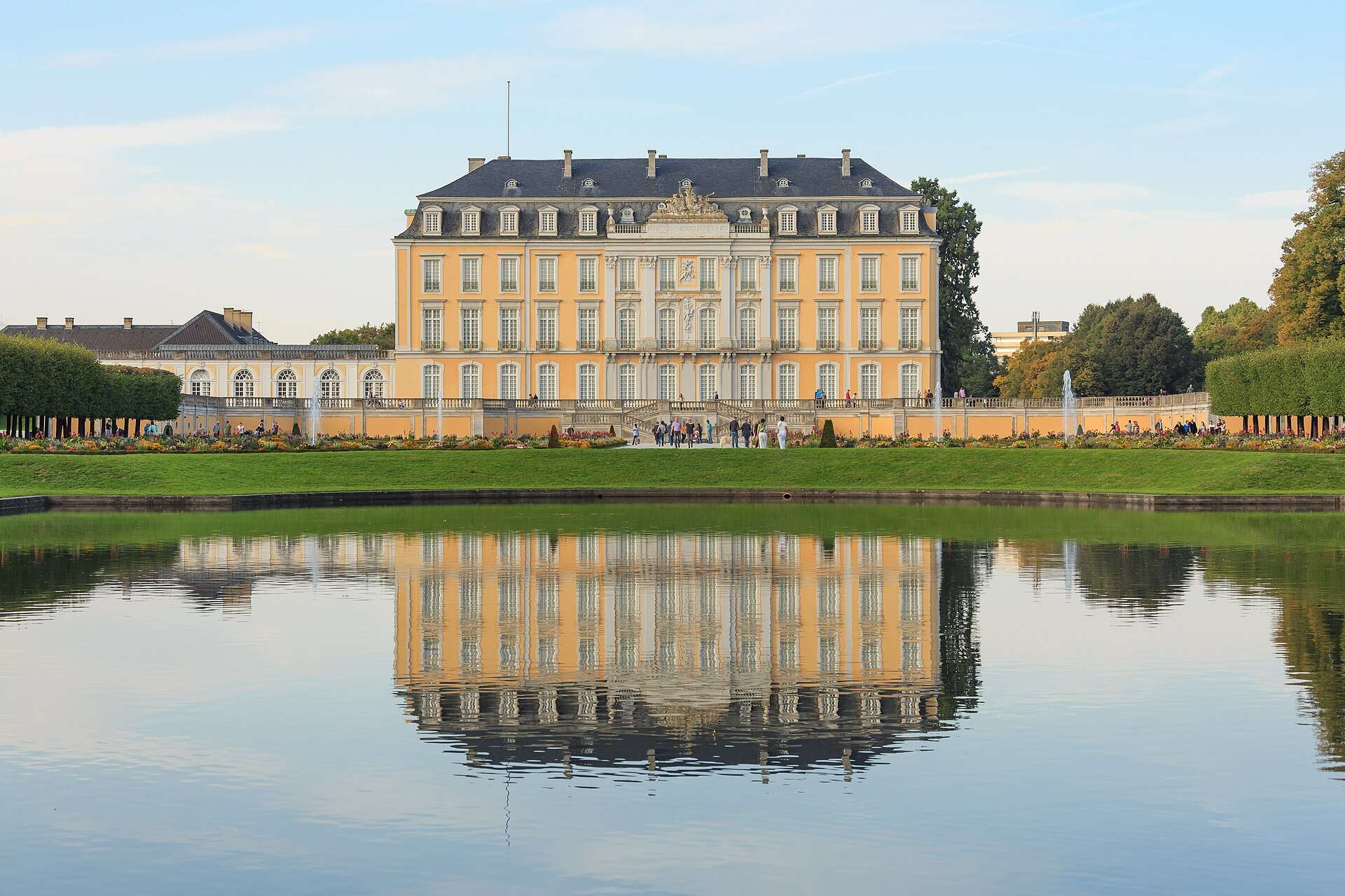 Schloss Augustusburg reflected in its garden pond, Brühl